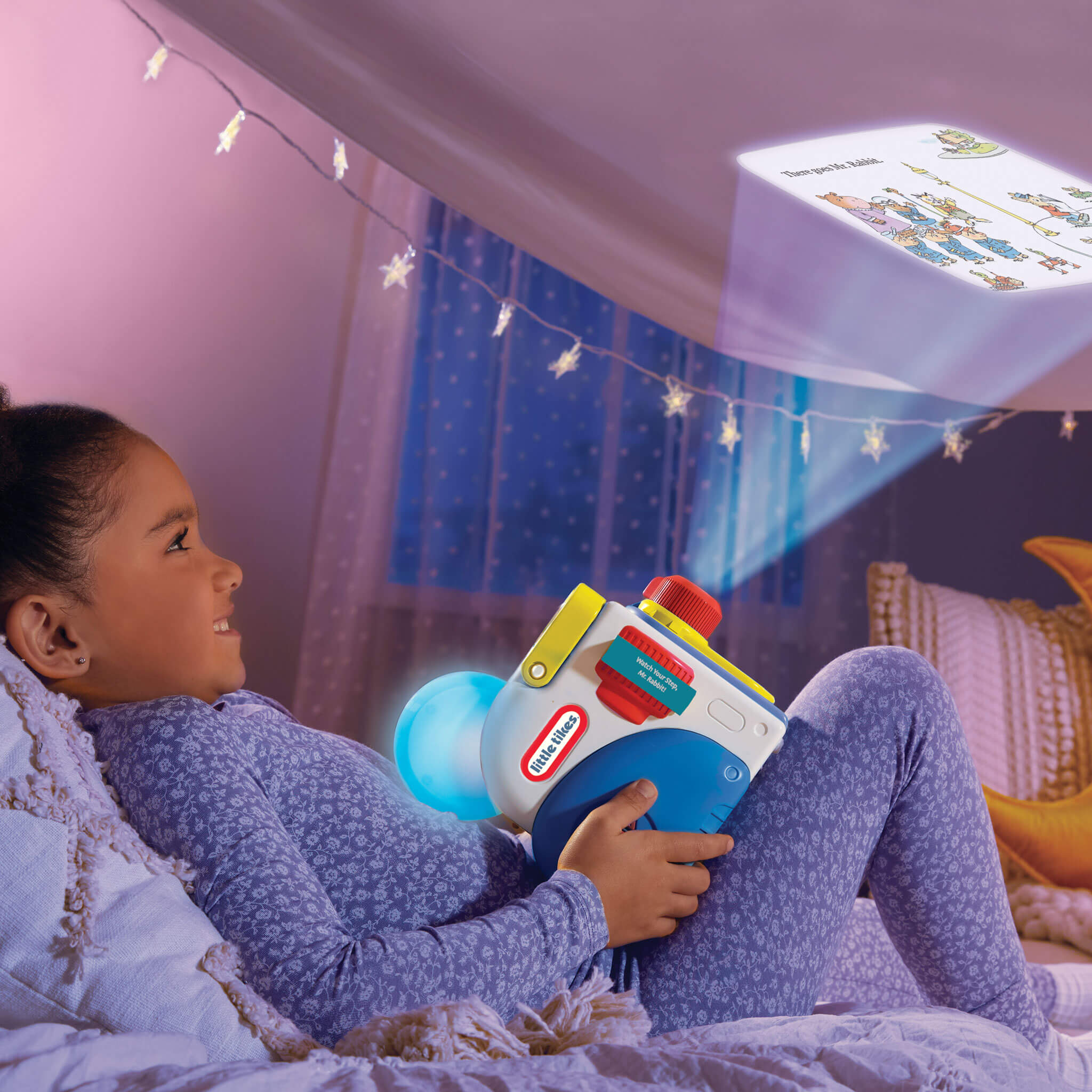 girl watching story for Busytown on the ceiling