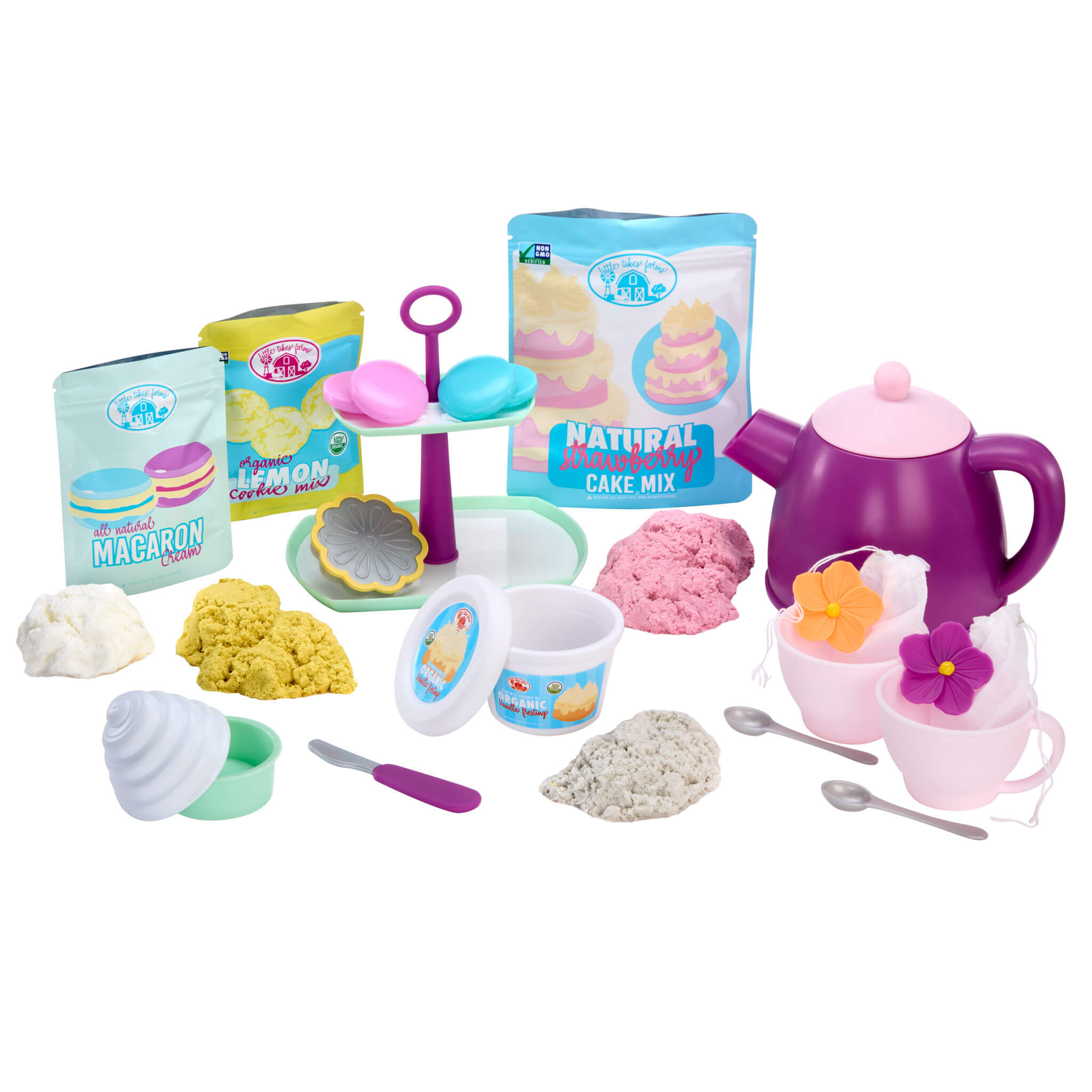 Toy tea set with various items on a white background